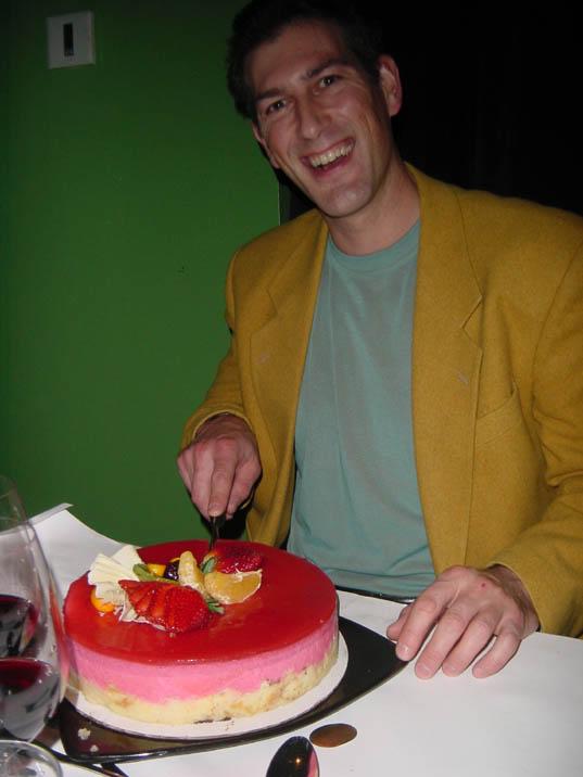 2002-01-19i Tom cutting the cake.jpg