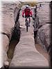 2002-11-01g Riding the slim rock.JPG