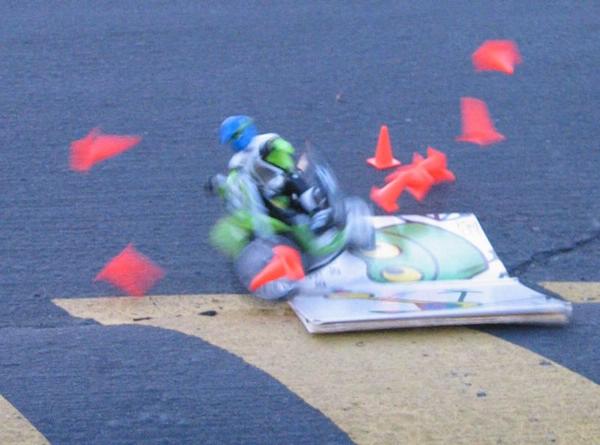 2003-03-01b Green guy smashing the cones.jpg