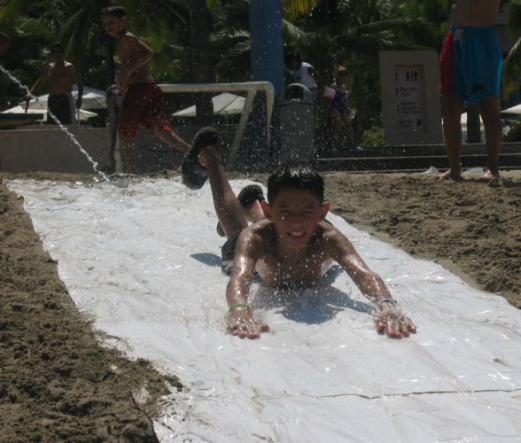 2003-07-03a Boy sliding.JPG