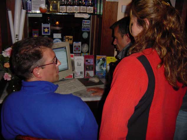 aDSC00059 Checking the latest weather at the Internet cafe