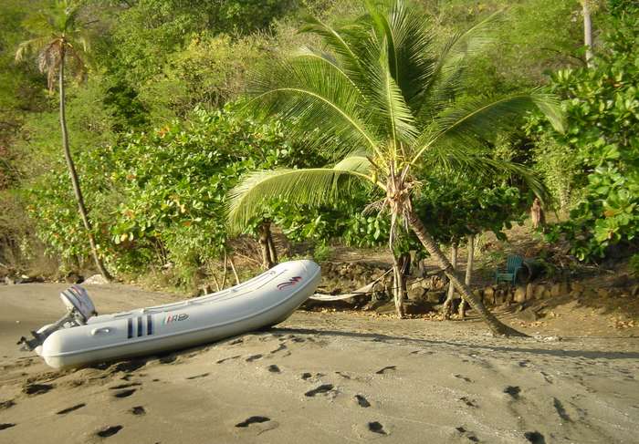 226 Our dinghy secured to a palm tree... we went ashore for drinks